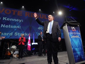 Jason Kenney waves to the crowd after winning the Alberta PC leadership in downtown Calgary on Saturday March 18, 2017.