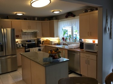 Before: The Scotts were originally going to gut their kitchen to get the new look and functionality they wanted.