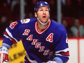 Esa Tikkanen lifts the Stanley Cup in 1994.  Rangers hockey, Edmonton  oilers hockey, New york rangers