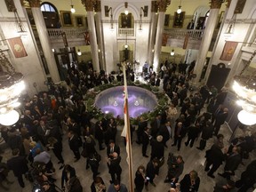 Reporters, communications staff and ministers conduct interview in the rotunda of the Alberta Legislature during Budget 2017 in Edmonton on Thursday, March 16, 2017.