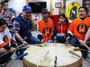 The Ermineskin Junior Senior High School drum group performs at a news conference for the local Kraft Hockeyville effort in Maskwacis on Friday, March 10, 2017.