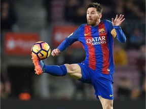 Barcelona forward Lionel Messi controls the ball during the Spanish league football match FC Barcelona vs Real Sporting de Gijon at the Camp Nou stadium in Barcelona on March 1, 2017.