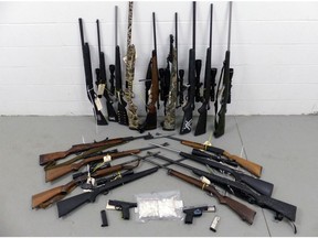 Twenty-two firearms were seized from a group of suspected cocaine dealers operating in the Whitecourt area. Photo supplied/ALERT