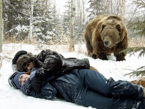 Jewel Staite, Shawn Roberts and Whopper the Bear in a scene from 40 Below and Falling, the world's first 3D romcom, filmed locally and directed by Dylan Pearce.