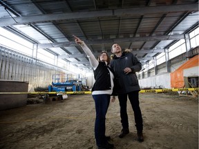 Whitemud Equine Learning Centre Association executive director Diane David and City Councillor Michael Walters tour the under-construction Whitemud Equine Centre's new riding arena, 12504 Fox Drive, in Edmonton Wednesday, March 1, 2017. The arena will include an indoor 20m x 60m riding ring, 16 horse stalls, 12 educational tie stalls, and a multi-purpose classroom. The new arena is scheduled to be completed in late Sept. 2017. Photo by David Bloom