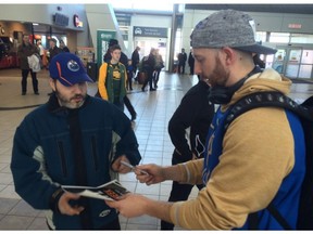 Winnipeg Blue Bombers quarterback Matt Nichols signs an autograph for fan Fred Clearihue at the Regina International Airport on Monday, March 20, 2017. Nichols is one of 60 players taking part in CFL Week in the city.