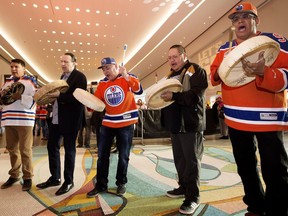 Members of the Logan Alexis Singers, a First Nations drumming group, perform in Ford Hall prior to the start of the Edmonton Oilers and San Jose Sharks game at Rogers Place, in Edmonton Thursday April 20, 2017.