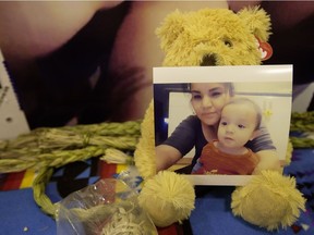 A photo of Dalyce Raine and her son Anthony Joseph Gordon Raine sits on a teddy bear inside the Chief Peter Bull Health and Wellness Memorial Centre, on the Louis Bull Tribe on Monday, April 24, 2017.