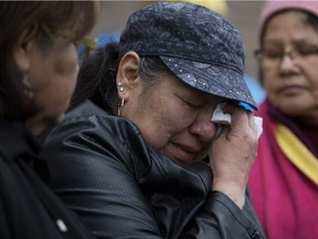 Connie Crier, paternal grandmother of slain toddler Anthony Raine, weeps as she thanks supporters at a vigil Tuesday outside the Good Shepherd Anglican Church, where the boy's body was found.
