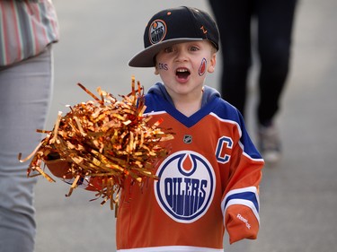 Gavin Mazurka, 4, heads to the Edmonton Oilers and San Jose Sharks NHL playoff at Rogers Place, in Edmonton Thursday April 20, 2017. Photo by David Bloom For a Jonny Wakefield story running April 18, 2017.