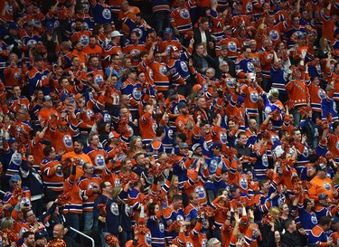 A sea of orange as fans cheer the Edmonton Oilers first goal between the San Jose Sharks during game one of the first round of NHL playoff action at Rogers Place in Edmonton, Thursday, April 12, 2017.