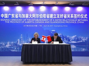 Alberta Premier Rachel Notley and MA Xingrui, governor of Guangdong, sign an agreement creating a sister-province relationship between Alberta and Guangdong. Supplied.