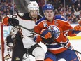 Anaheim Ducks' Antoine Vermette (50) and Edmonton Oilers' Connor McDavid (97) vie for position in front of the net during second period NHL action in Edmonton, Alta., on Saturday, April 1, 2017.