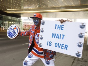 Blair Gladue cheers on the streets before the Oilers take on the San Jose Sharks during first round of the playoffs in Edmonton, Alta., on Wednesday, April 12, 2017.