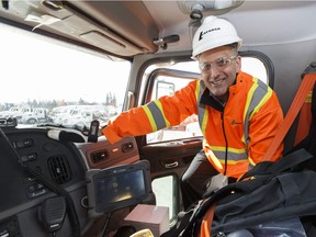Bruce Willmer, vice-president for Lafarge Canada in greater Edmonton, explains the GPS and driver-performance monitoring equipment on one of their trucks in Edmonton on Friday, April 21, 2017.