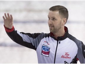Canada skip Brad Gushue celebrates his win over Sweden following the page 1-2 at the Men's World Curling Championships in Edmonton, Friday, April 7, 2017.
