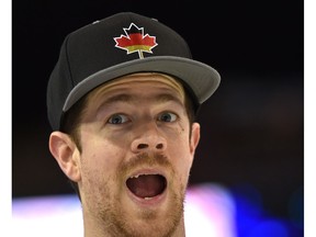 Canadian Ryan Sherrard, who plays lead for Germany, hams it up for the camera at the World Men's Curling Championship at Northlands Coliseum in Edmonton on Monday, April 3, 2017. (Ed Kaiser)