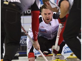 Canadian skip Brad Gushue talks to his sweepers on the way to an 8-2 win over Germany in six ends at the world curling championship at Northlands Coliseum in Edmonton on Tuesday, April 4, 2017. (Ed Kaiser)