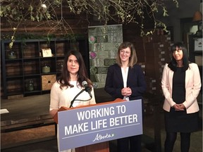 Carrie Belcourt, the owner of Mother Earth Essentials, speaks about her experience as an entrepreneur on April 25, 2017. Status of Women Minister Stephanie McLean (left) and Marcela Mandeville, the CEO of Alberta Women Entrepreneurs, look on.