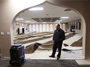 Centre Manager Bassam Fares looks at the damage following a flood at the MAC Islamic Centre, 6104 172 St., in Edmonton, AB on Tuesday April 18, 2017. Photo by David Bloom