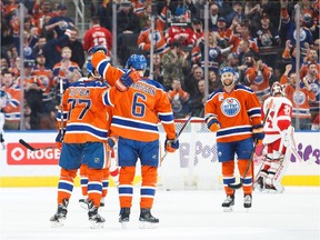 Edmonton Oilers defencemen Oscar Klefbom, left, and Adam Larsson celebrate Larsson's goal against the Detroit Red Wings on March 4, 2017, at Rogers Place in Edmonton. (Getty Images)