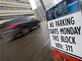 The city is banning parking along Jasper and Whyte Avenues during Oilers playoff game days. File photo.
