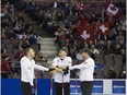 EDMONTON ALBERTA: April 8, 2017 Team USA between ends of the Ford World Men's Curling at Northlands Coliseum, in Edmonton April 8, 2017.