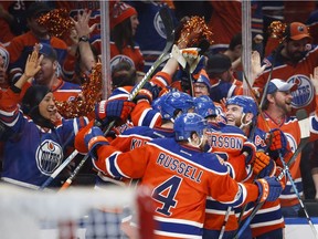 Edmonton Oilers celebrate their win following overtime NHL hockey round one playoff action against the San Jose Sharks, in Edmonton, Thursday, April 20, 2017.