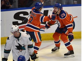 Edmonton Oilers centre David Desharnais (13) celebrates his overtime goal with teammate Leon Draisaitl (29) after Desharnais scored in overtime to beat the San Jose Sharks 4-3 in Game 5 of their first-round NHL playoff series on April 20, 2017, at Rogers Place.
