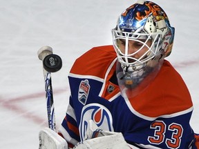 Edmonton Oilers goalie Cam Talbot has the puck bounce out of his glove against the New York Islanders during NHL action at Rogers Place in Edmonton on March 7, 2017.