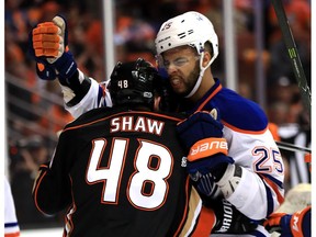 ANAHEIM, CA - APRIL 26:  Darnell Nurse #25 of the Edmonton Oilers punches Logan Shaw #48 of the Anaheim Ducks  in the first period in Game One of the Western Conference Second Round during the 2017  NHL Stanley Cup Playoffs at Honda Center on April 26, 2017 in Anaheim, California.