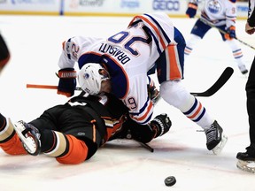 Edmonton Oilers forward leon Draisaitl pushes Anaheim Ducks centre Ryan Getzlaf to the ice in the second period in Game 1 of their Western Conference semifinal playoff series on April 26, 2017, at Honda Center in Anaheim, Calif.