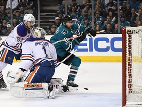 Joe Pavelski #8 of the San Jose Sharks scores past goalie Laurent Brossoit #1 of the Edmonton Oilers during the second period in Game Four of the Western Conference First Round during the 2017 NHL Stanley Cup Playoffs at SAP Center on April 18, 2017 in San Jose, California.