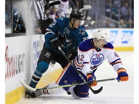 Marcus Sorensen of the San Jose Sharks checks Anton Slepyshev of the Edmonton Oilers during Game 6 of their Western Conference opening round series at SAP Center on Saturday, April 22, 2017, in San Jose, Calif. (Ezra Shaw/Getty Images)