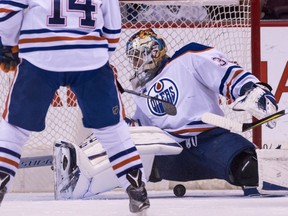 VANCOUVER, BC - APRIL 8: Goalie Cam Talbot #33 of the Edmonton Oilers looses sight of the puck but keeps it out of the net after making a save against the Vancouver Canucks in NHL action on April 8, 2017 at Rogers Arena in Vancouver, British Columbia, Canada.