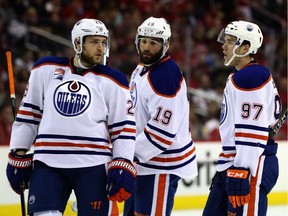 From left, Edmonton Oilers linemates Leon Draisaitl, Patrick Maroon and Connor McDavid during a pause in NHL game action in Washington, D.C., on Feb. 24, 2017.