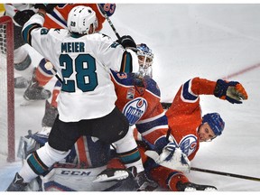 Edmonton Oilers' Zack Kassian and San Jose Sharks' Timo Meier crash into Oilers goalie Cam Talbot during Game 5 of their opening round playoff series at Rogers Place in Edmonton on Thursday, April 20, 2017. (Ed Kaiser)