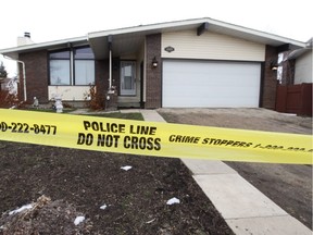 A 53-year-old woman found slain in her northeast Edmonton home Easter Monday died of a stab wound, an autopsy has confirmed.