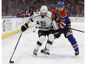 Edmonton Oilers defenceman Darnell Nurse battles Los Angeles Kings' Kyle Clifford at Rogers Place in Edmonton on March 28, 2017. (Ian Kucerak)