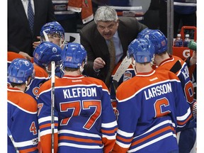Edmonton's head coach Todd McLellan speaks to his players during a timeout in the third period of a NHL game between the Edmonton Oilers and the LA Kings at Rogers Place in Edmonton on Tuesday, March 28, 2017.