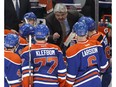 Edmonton's head coach Todd McLellan speaks to his players during a timeout in the third period of a NHL game between the Edmonton Oilers and the LA Kings at Rogers Place in Edmonton on Tuesday, March 28, 2017.