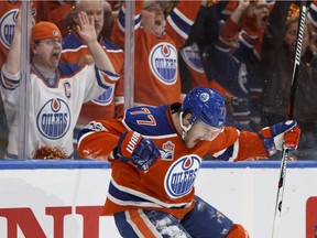 Edmonton's Oscar Klefbom (77) celebrates a goal on San Jose's goaltender Martin Jones (31) during a Stanley Cup playoffs game between the Edmonton Oilers and the San Jose Sharks at Rogers Place in Edmonton on Wednesday, April 12, 2017.