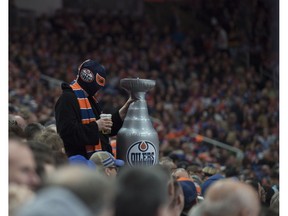 Edmonton Oilers fans get into the playoff spirit at Rogers Place in Edmonton during the team's regular-season finale on April 9, 2017. (Shaughn Butts)