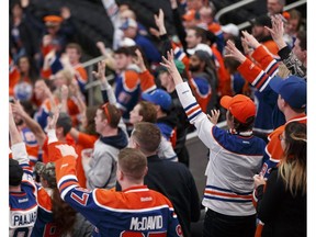 Fans watch the Edmonton Oilers take on the San Jose Sharks during the Oilers Orange Crush Road Game Watch Party at Rogers Place in Edmonton on Sunday, April 16, 2017. (Ian Kucerak)