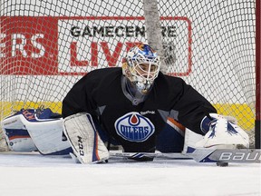 Goaltender Cam Talbot makes a save during an Edmonton Oilers practice on Saturday April 15, 2017 in Edmonton.