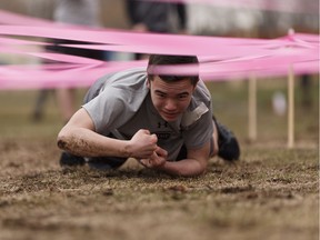 Grade 7 student Nathan Robinson races through the obstacle course at Vimy Ridge Academy as he learns the skills Canadian soldiers used in the 1917 Battle of Vimy Ridge in Edmonton on Wednesday, April 26, 2017.