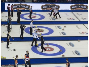 Hardcore curling fans watch the first day of curling at the Mens's World Curling Championships at Northlands Coliseum on April 1, 2017.