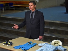 Homicide Staff Sgt. Duane Hunter talks to the media about the death of a toddler discovered this afternoon, and seek the public's assistance in identifying the toddlers clothes laid out on the table at police headquarters in Edmonton, April 21, 2017.