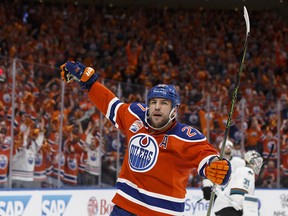 Edmonton's Milan Lucic (27) celebrates a goal on San Jose's goaltender Martin Jones (31) during a Stanley Cup playoffs game between the Edmonton Oilers and the San Jose Sharks at Rogers Place in Edmonton on Wednesday, April 12, 2017. Ian Kucerak / Postmedia