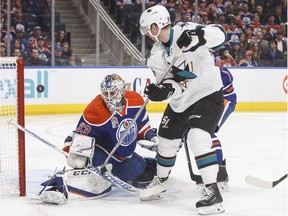 San Jose Sharks' Jannik Hansen (36) scores a goal against Edmonton Oilers goalie Cam Talbot (33) during first period NHL action in Edmonton, Alta., on Thursday, March 30, 2017.
